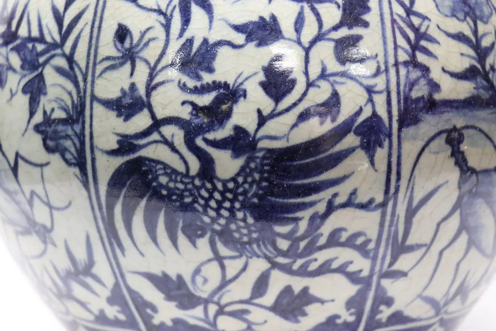 Blue and white double gourd vase with panelled phoenix and floral decoration, angled view