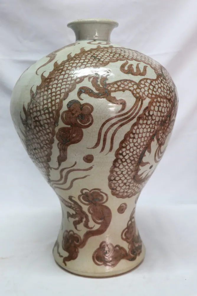 Meiping vase, front view, with a scaled dragon in copper red coiling around the body