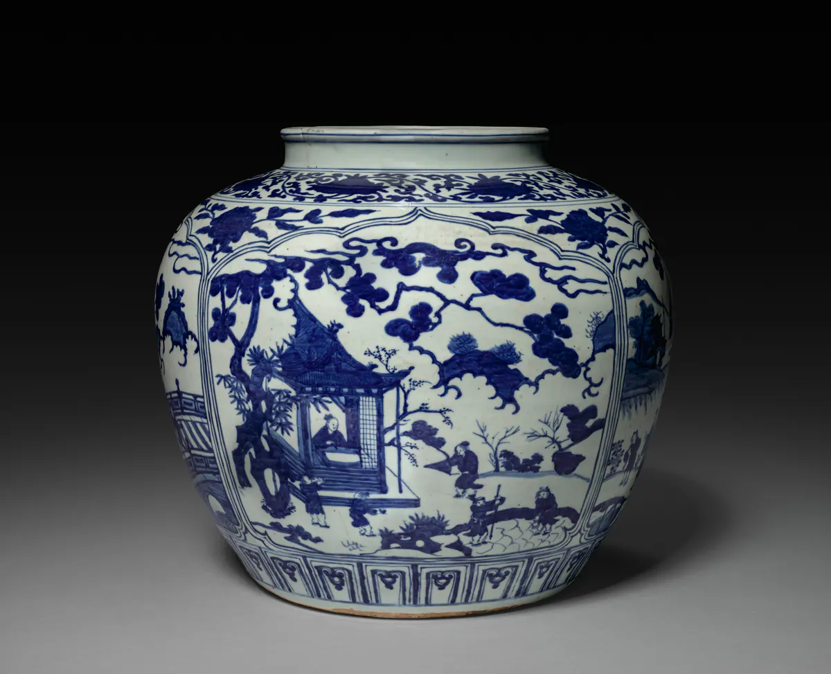 Jiajing mark and reign blue and white jar painted with a scholar in a pavilion, figures and pine trees in a shaped panel, in a deep, strong, slightly purplish blue.